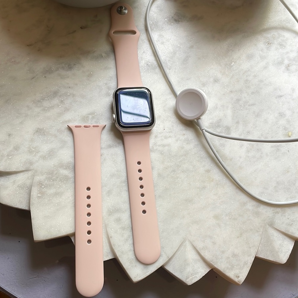 Apple iwatch SE 40mm. Silver face watch with pink bands. Like new!